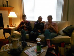 Knitting, knitting, knitting...and looking at Mary's phone. Maybe at knitting photos! 