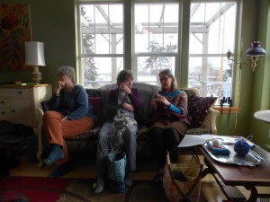 You can see the snow outside the window behind Leslie, Deb and Michele.